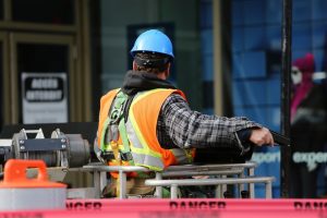 Man wearing hardhat at construction site